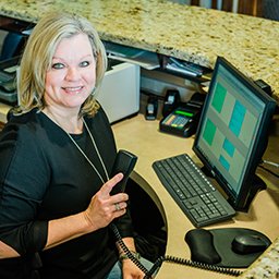 Team member at front desk