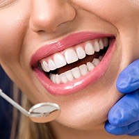 Closeup of patient receiving dental exam