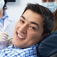 Smiling man in dental chair