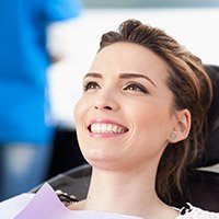 Smiling woman in dental chair