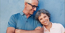 Smiling senior man and woman outdoors